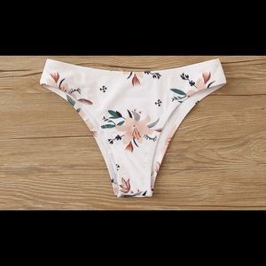 *Brand New* Never worn. Floral Bikini bottoms.